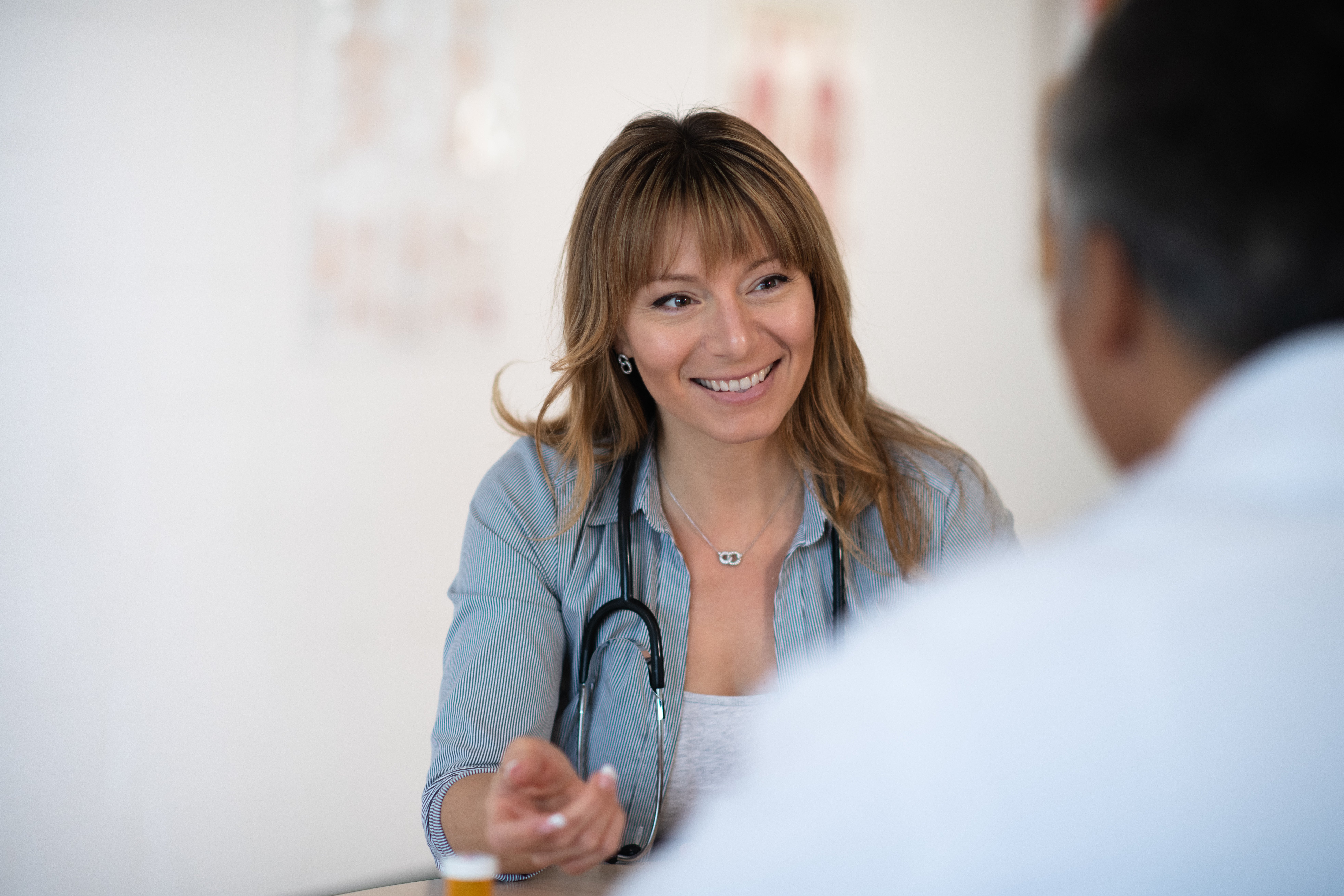 healthcare worker talking with patient